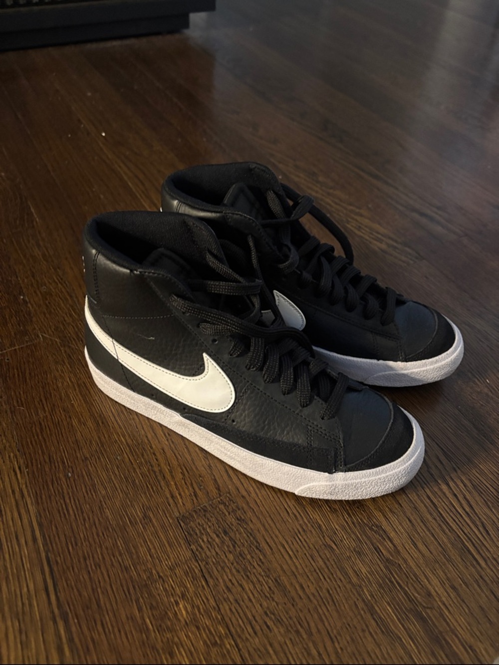 Nike Black and White Mid-Top Sneakers